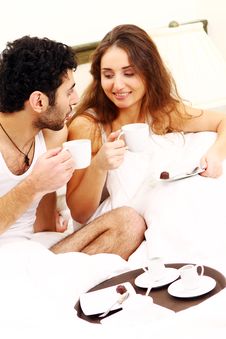 Young Couple Having Breakfast In Bed Royalty Free Stock Photos Young Couple Having Breakfast In Bed Royalty Free Stock Photos