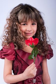 Beautiful Little Girl With Red Rose Royalty Free Stock Images