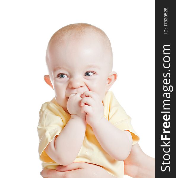 Small happy baby boy on a white background