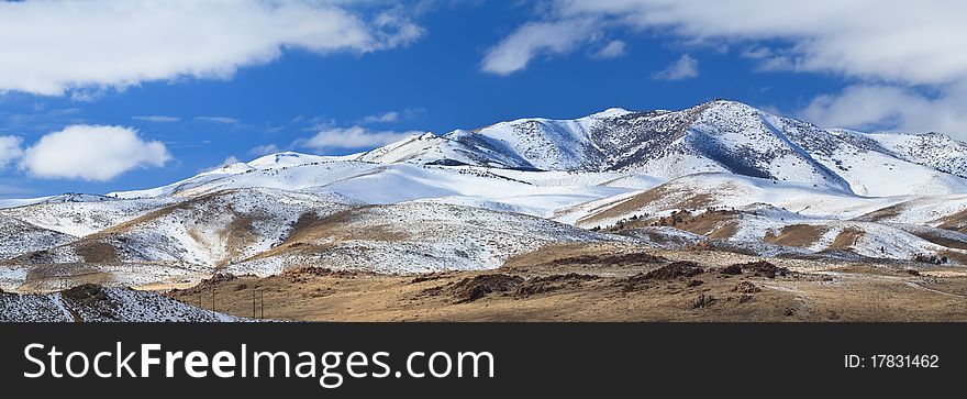 Mountain covered with snow, panoramic view. Mountain covered with snow, panoramic view