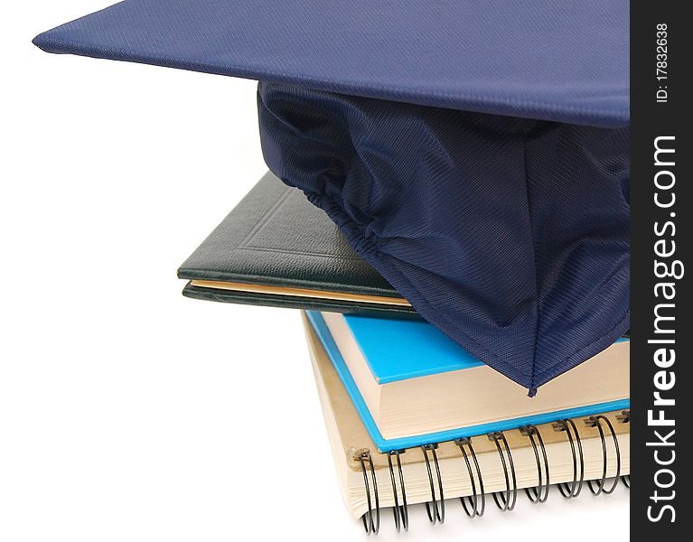 Books and hat graduation