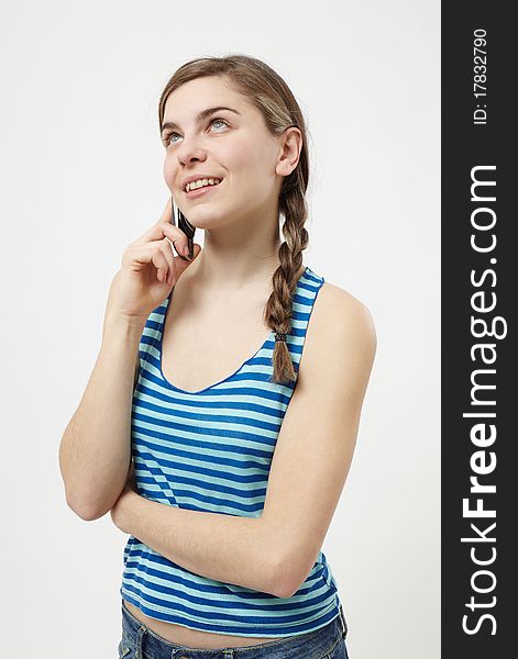 Young woman talking on the mobile phone