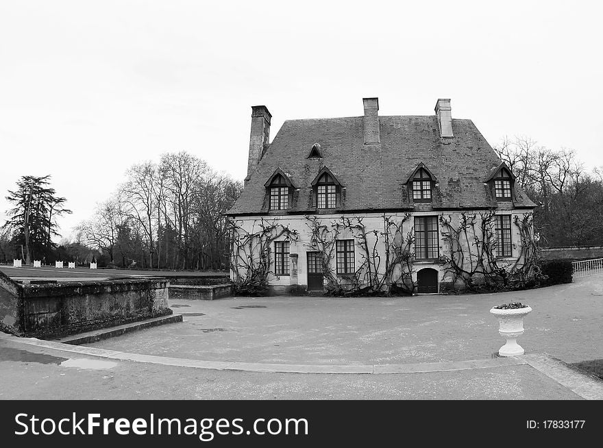 Black and white photo of the Chancellerie house at Chenonceau Castle in the Loire Region of France during winter. Black and white photo of the Chancellerie house at Chenonceau Castle in the Loire Region of France during winter.