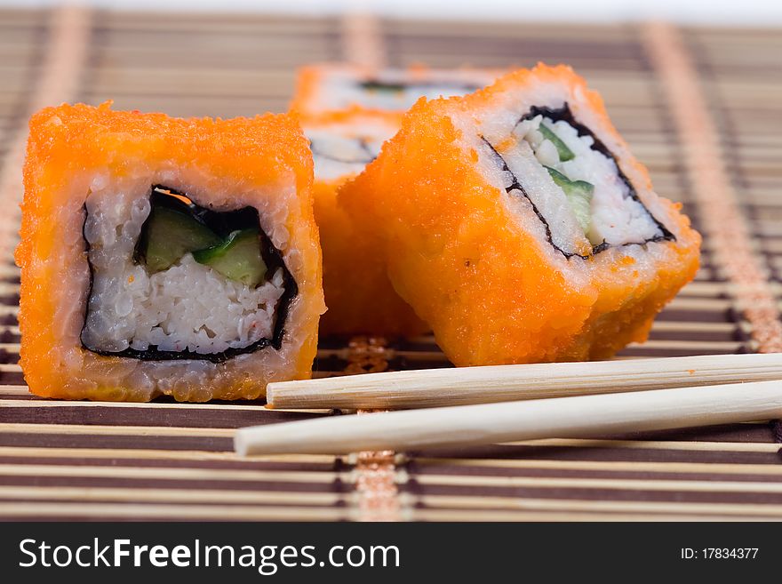 Traditional japanese sushi and rolls close up