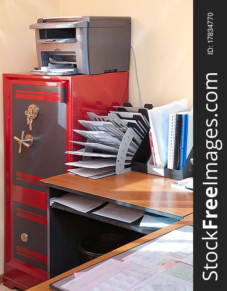 The red safe costs at office. The red safe costs at office.