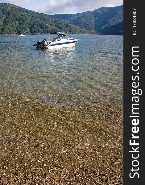 Motorboat rests in Abel Tasman national park, New Zealand