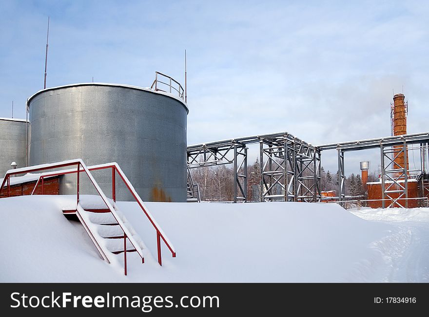 Industrial Complex storage tanks and a pipe. Industrial Complex storage tanks and a pipe