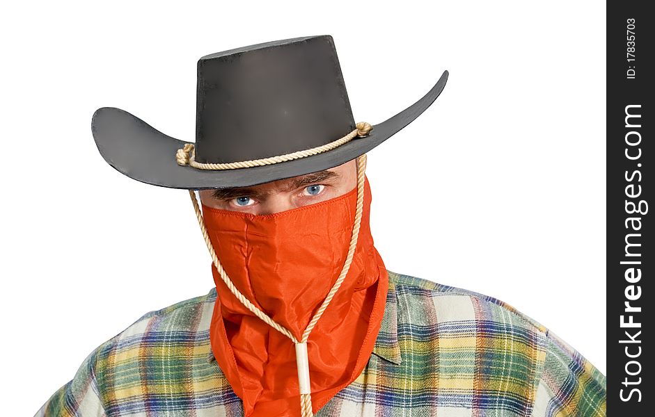 One man in cowboy dress and hat. Shooting in the studio. One man in cowboy dress and hat. Shooting in the studio.