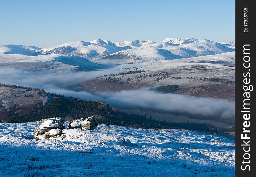 Cairngorm mountains on cold winter day with cloud inversion. Cairngorm mountains on cold winter day with cloud inversion