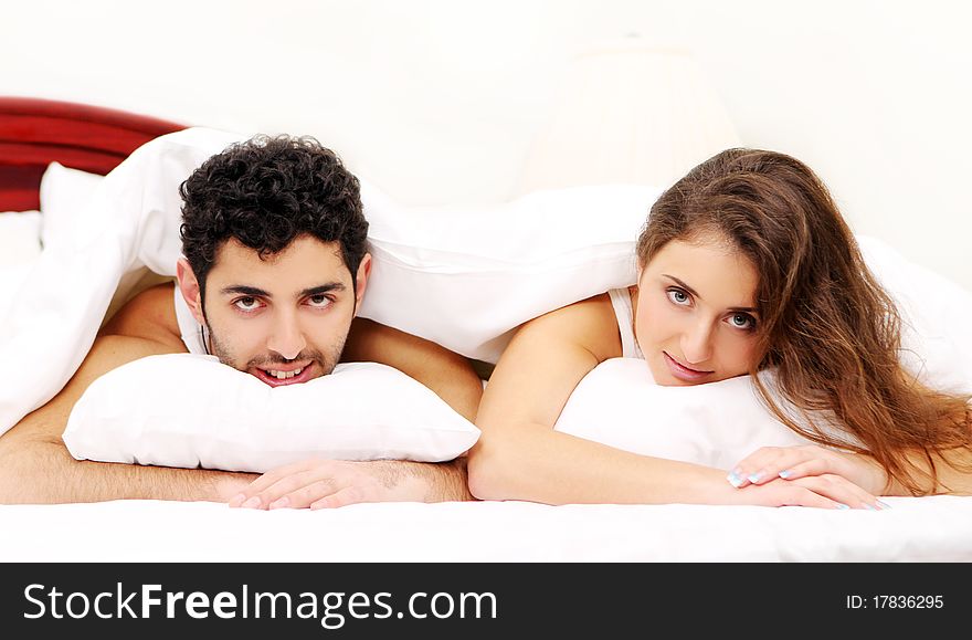 Young couple in bed