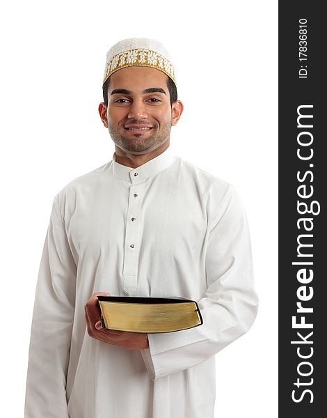 An ethnic mixed race man wearing cultural clothing is holding a book and smiling. An ethnic mixed race man wearing cultural clothing is holding a book and smiling.