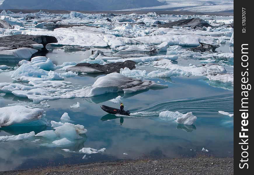 Boat and icebergs at Jokulsarlon glacial lake, Iceland. Boat and icebergs at Jokulsarlon glacial lake, Iceland