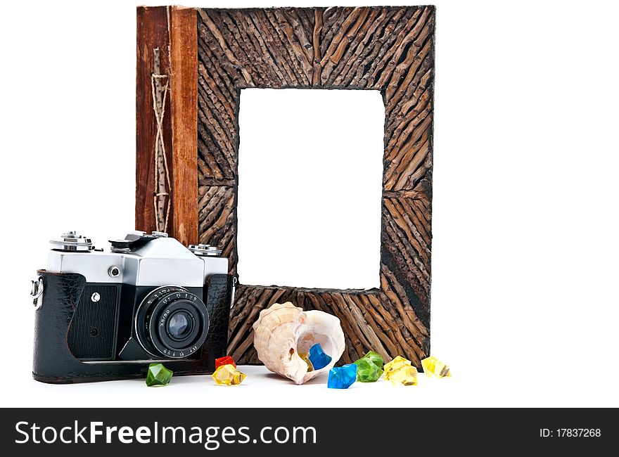 Vintage camera  and photo album with empty picture. Isolated on white. Vintage camera  and photo album with empty picture. Isolated on white