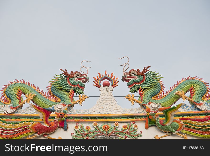 Twin chinese dragon as light blue sky