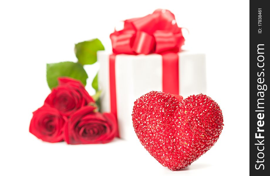 Red heart with red roses and gift