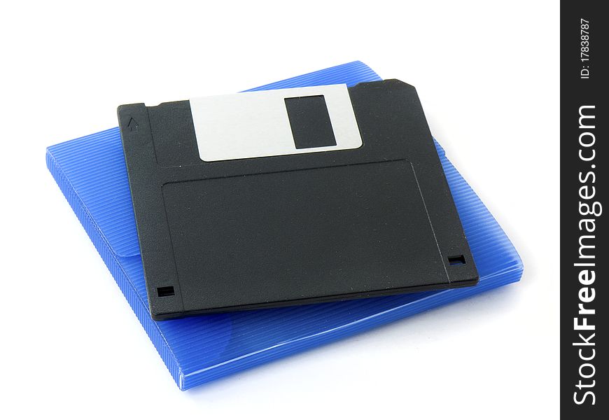 Old Floppy Disk And A Blue Case