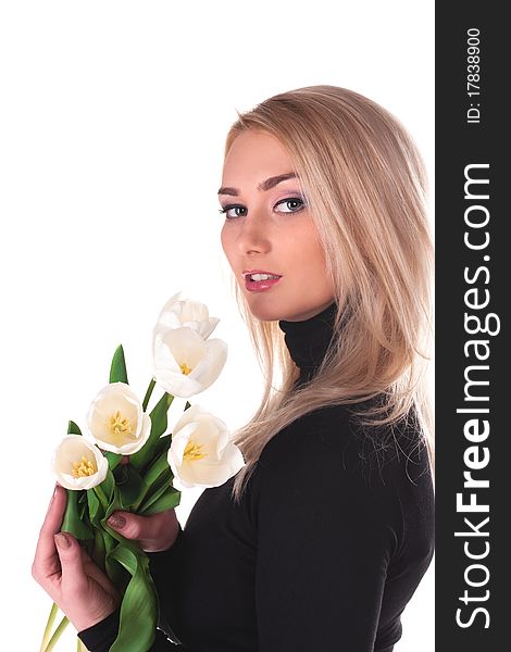 Beautiful young woman with tulips