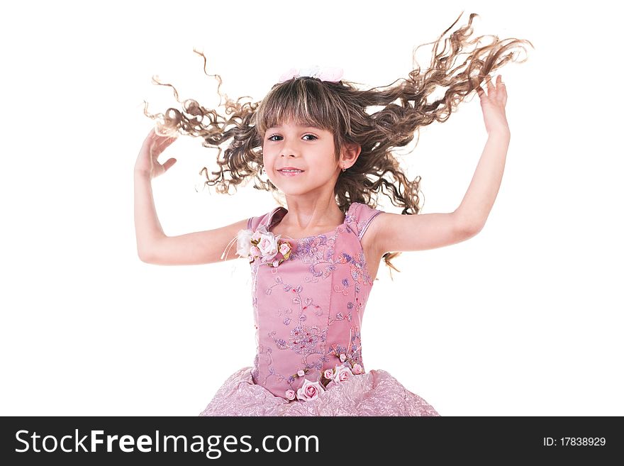 Beautiful little girl dancing and hands up