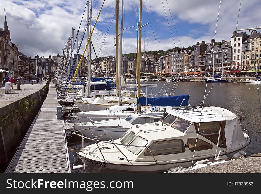 French harbor in Honfleur. Sunny day