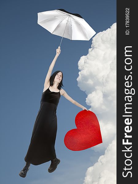 Isolated flying on umbrella lady in black dress. Isolated flying on umbrella lady in black dress