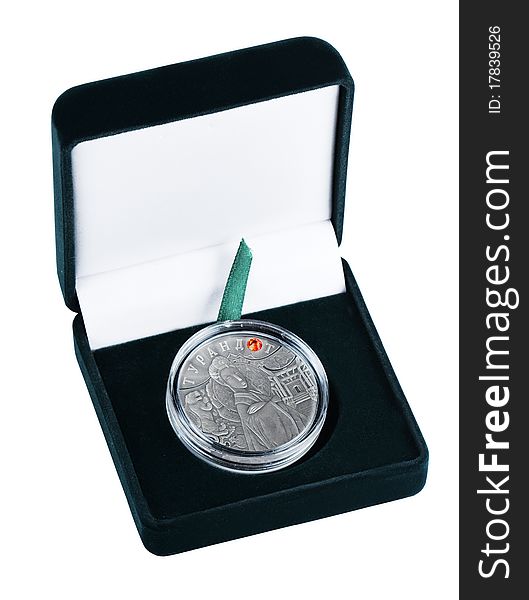 Silver coin in a case