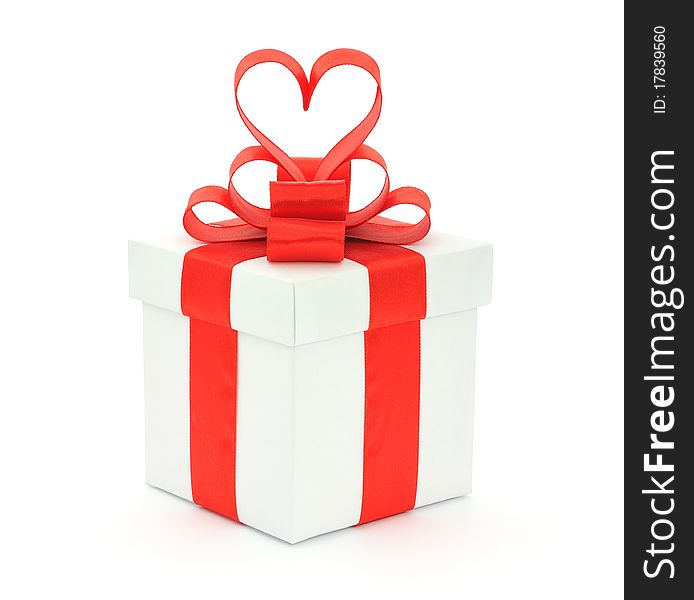 Gift box, bow and heart on a white background