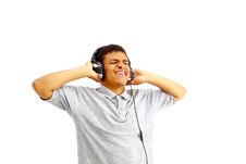 Young Happy Man Listening To Music Royalty Free Stock Image