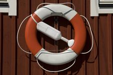 Lifebuoy Haning On A House Stock Images Lifebuoy Haning On A House Stock Images