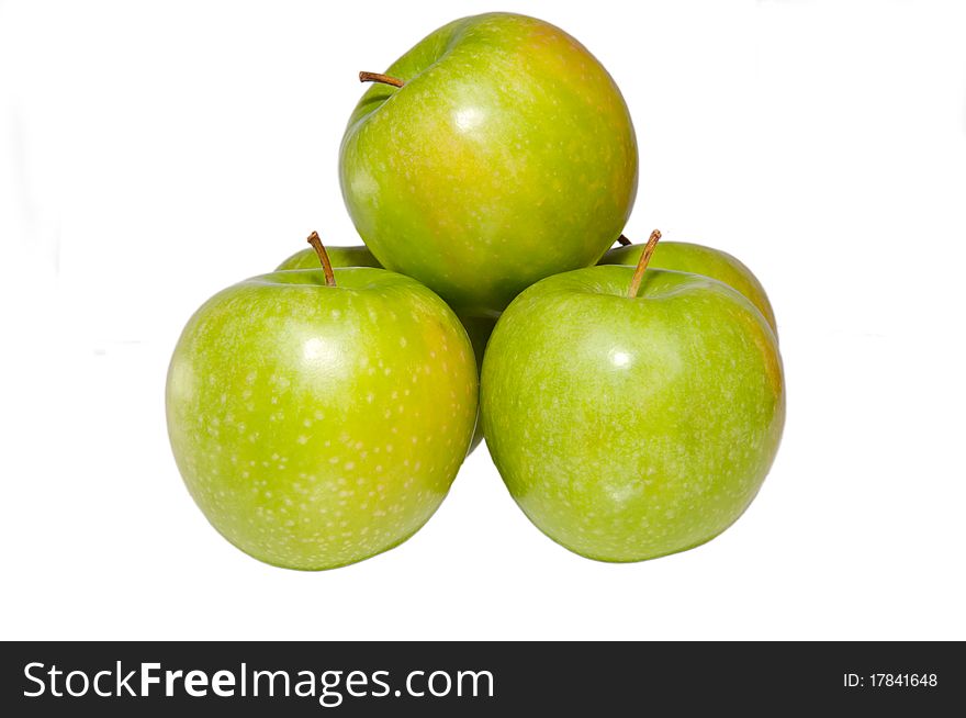 Green apples heap on white background, isolated