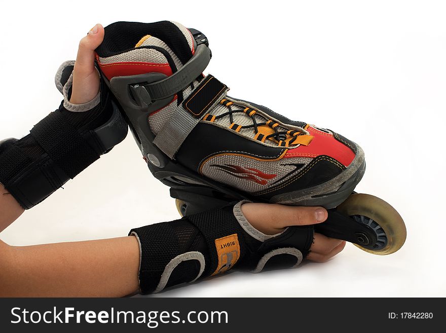 Roller skates in hand