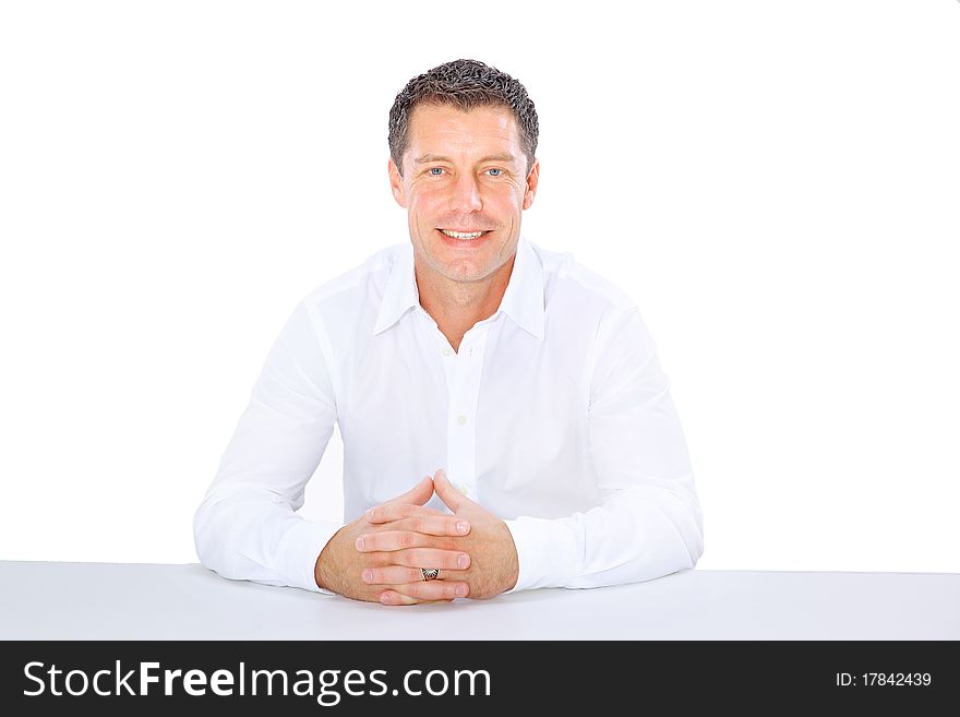 Closeup portrait of a senior man smiling on white background