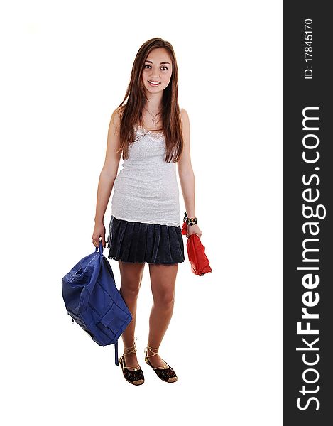 A pretty teenager in a short skirt and a blue backpack in her hand and
an folded umbrella, standing in the studio for white background. A pretty teenager in a short skirt and a blue backpack in her hand and
an folded umbrella, standing in the studio for white background.