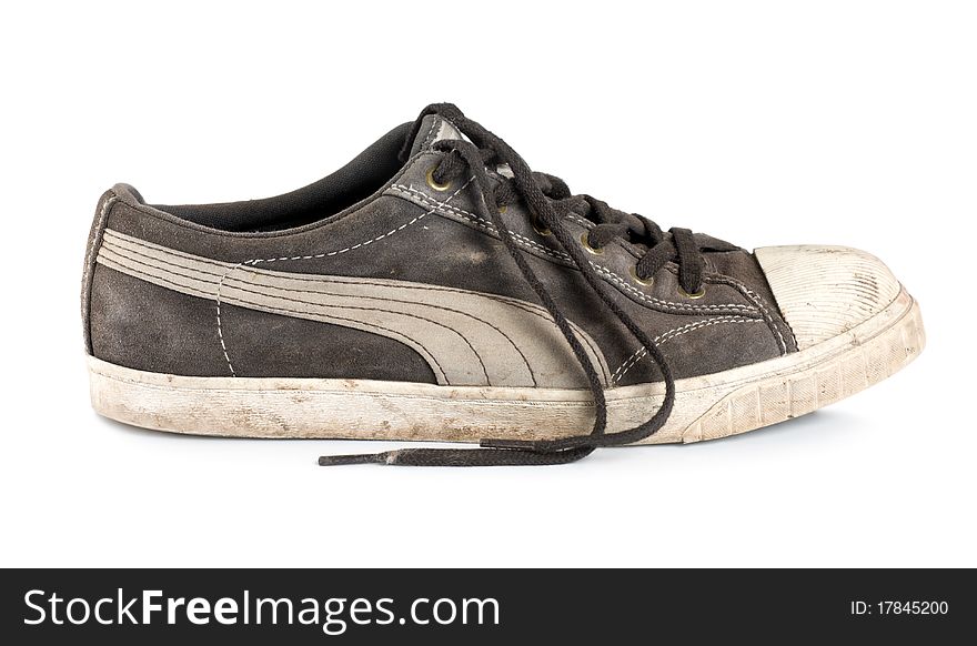 Old dirty sneakers isolated on white background. Old dirty sneakers isolated on white background