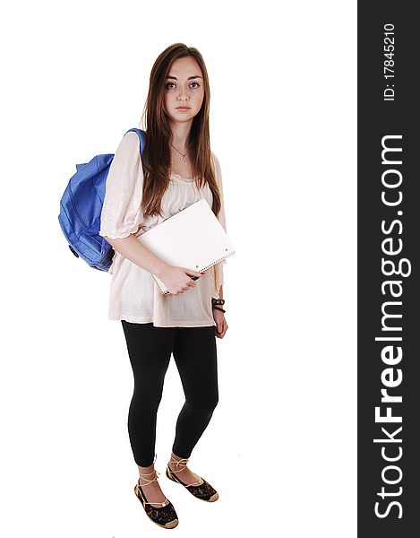 A pretty teenager in black tights and a blue backpack over her
shoulder standing in the studio for white background. A pretty teenager in black tights and a blue backpack over her
shoulder standing in the studio for white background.