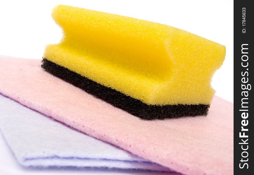 Cleaning sponge and wiping cloth isolated on white background. Cleaning sponge and wiping cloth isolated on white background
