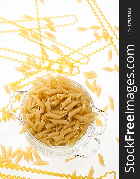 Food series: uncooked pasta in glassy bowl