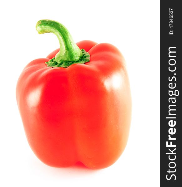 Ripe red pepper over white
