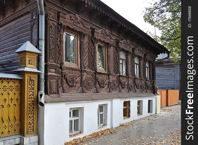 Beautiful brown wooden house with carved ornament in front, Suzdal, Russia. Beautiful brown wooden house with carved ornament in front, Suzdal, Russia