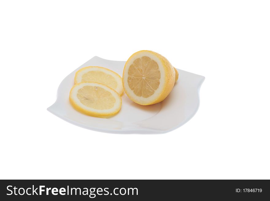 Lemon slices on white plate. Lemon slices on white plate