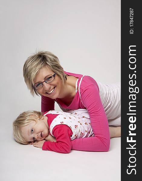 Portrait of cute girl with her mother having fun. Portrait of cute girl with her mother having fun