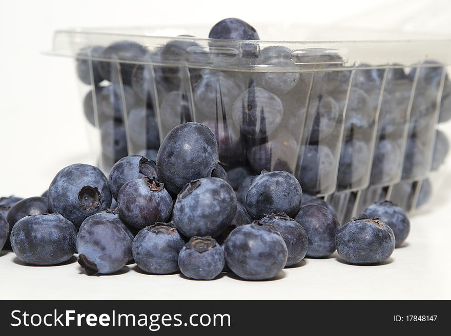 Fresh biological blueberries on white background