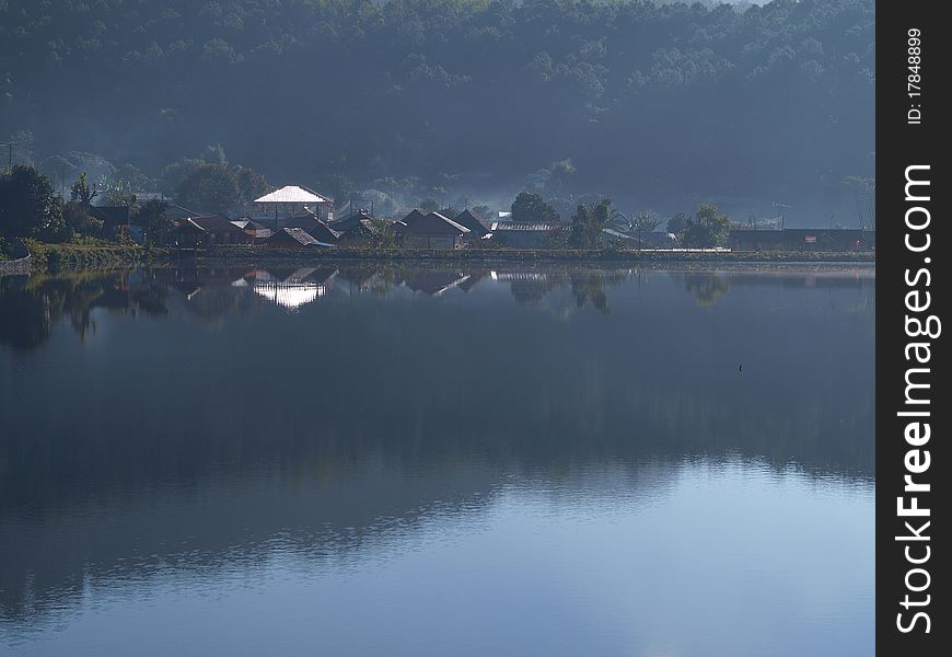 Beautiful a hut refection on lake, North of Thailand.