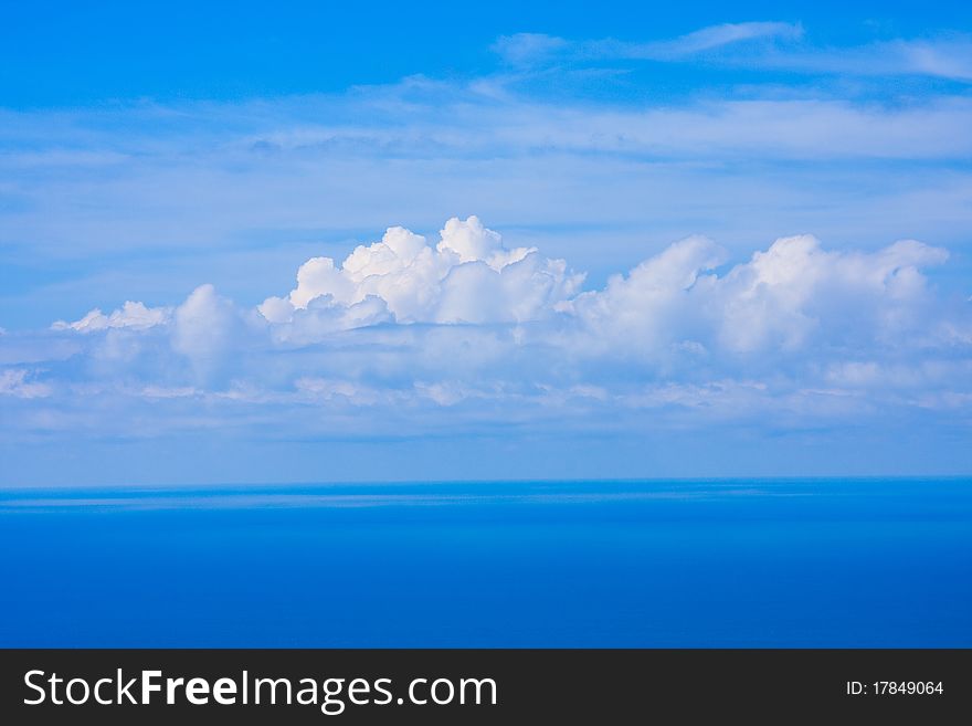 The beautiful blue sky with clouds over the sea. The beautiful blue sky with clouds over the sea