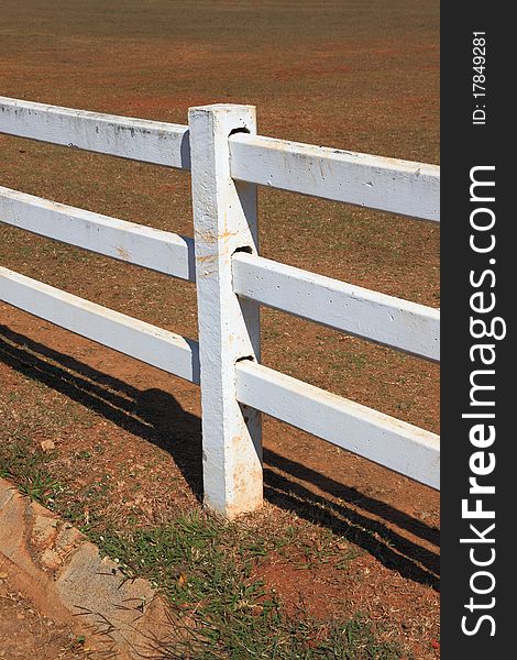 White pole fence in country farm.