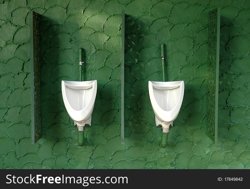 Men toilet with white urinal