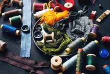 Sewing Kit Accessories For Handicraft Or Needlework On Dark Stone Table Stock Image