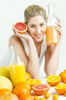 Woman With Citrus Fruit Royalty Free Stock Photo