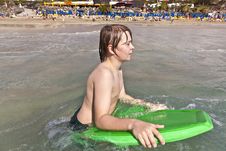 Boy Has Fun At The Beach Stock Images