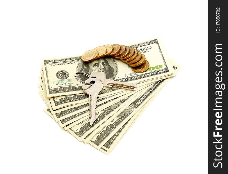 Keys and stack of dollars isolated on a white background