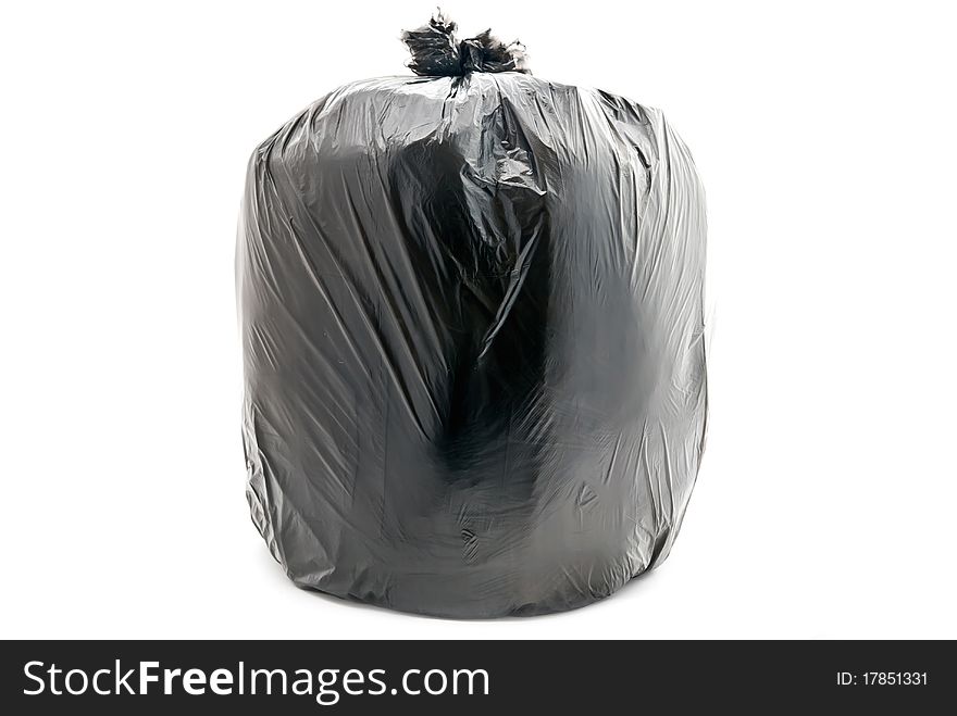 Tied garbage bag isolated on a white background. Tied garbage bag isolated on a white background.